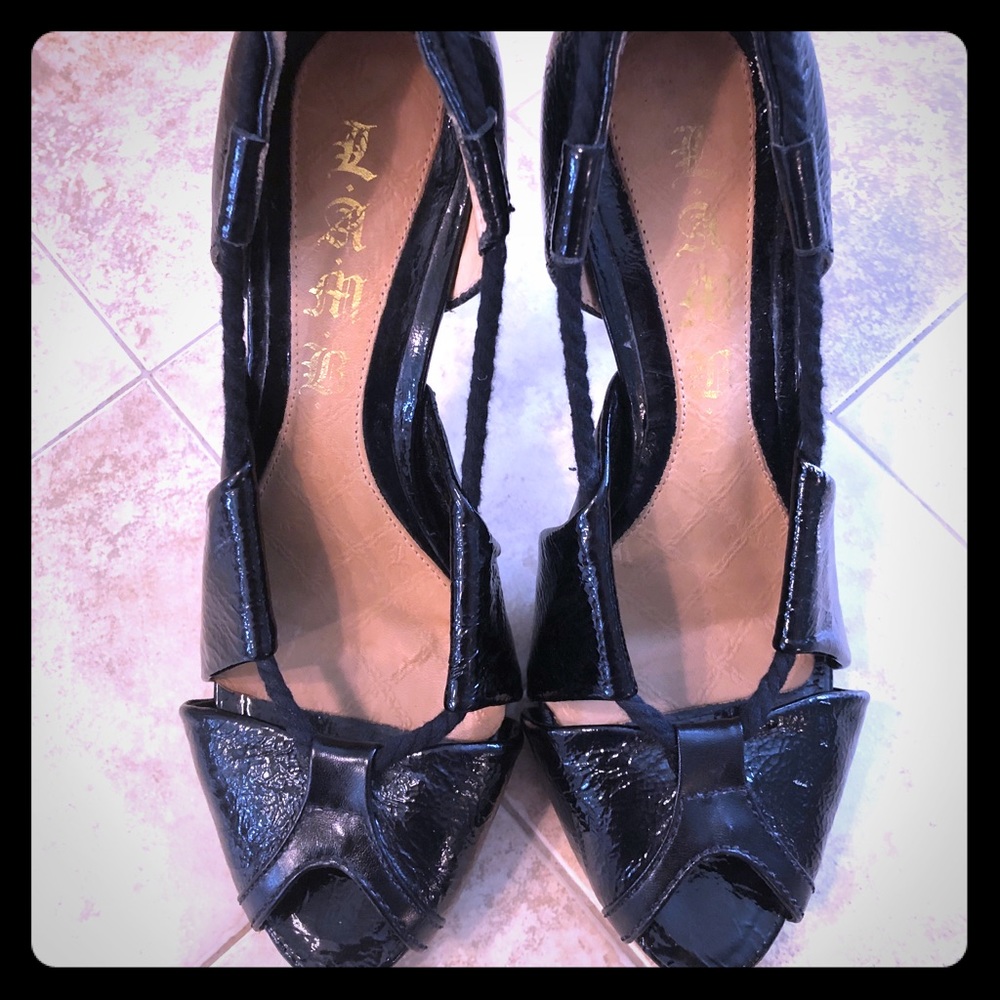 L.A.M.B. Patent leather open toe heels.